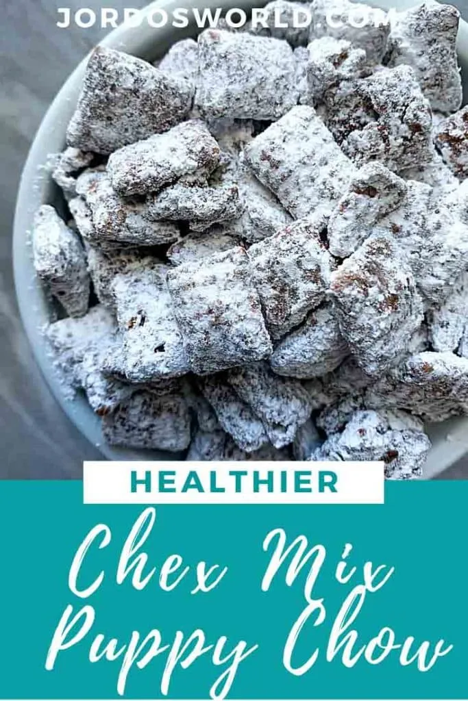 This is a pinterest pin for healthy puppy chow. There is a white bowl filled with chex cereal covered in chocolate and peanut butter coating and white powdered sugar.